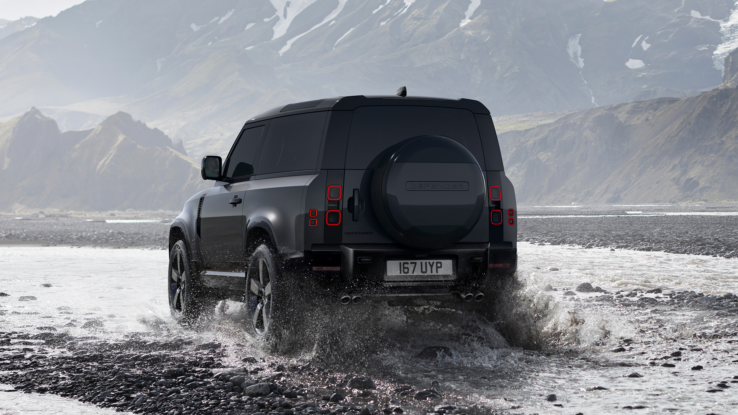 Back Side view of Defender kon mud road